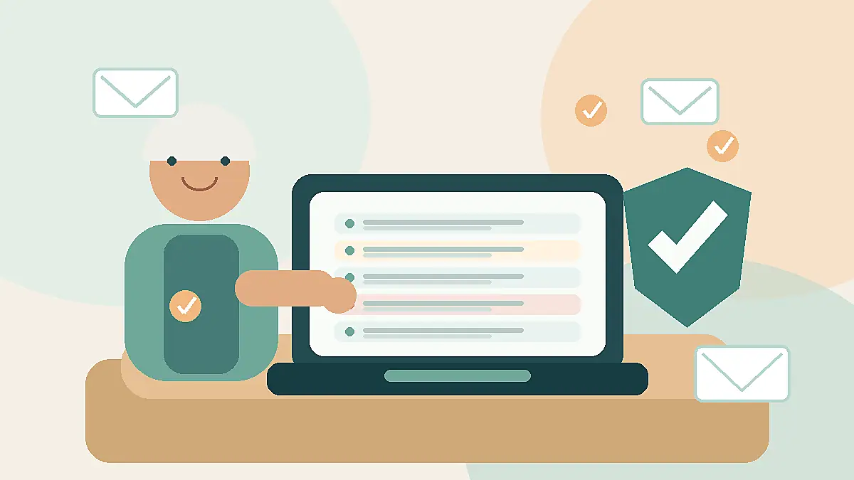 Older adult sorting spam emails safely on a laptop